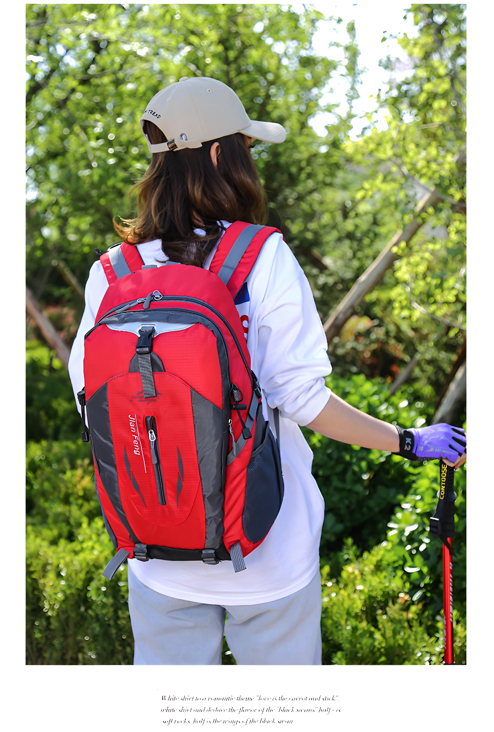 Red 40L waterproof hiking backpack, lightweight with multiple compartments, shown outdoors worn by a hiker.