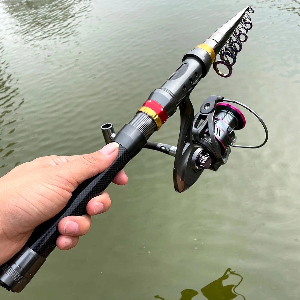 Adjustable telescopic fishing rod and reel combo placed near a lake, surrounded by watercraft and recreational fishing equipment.