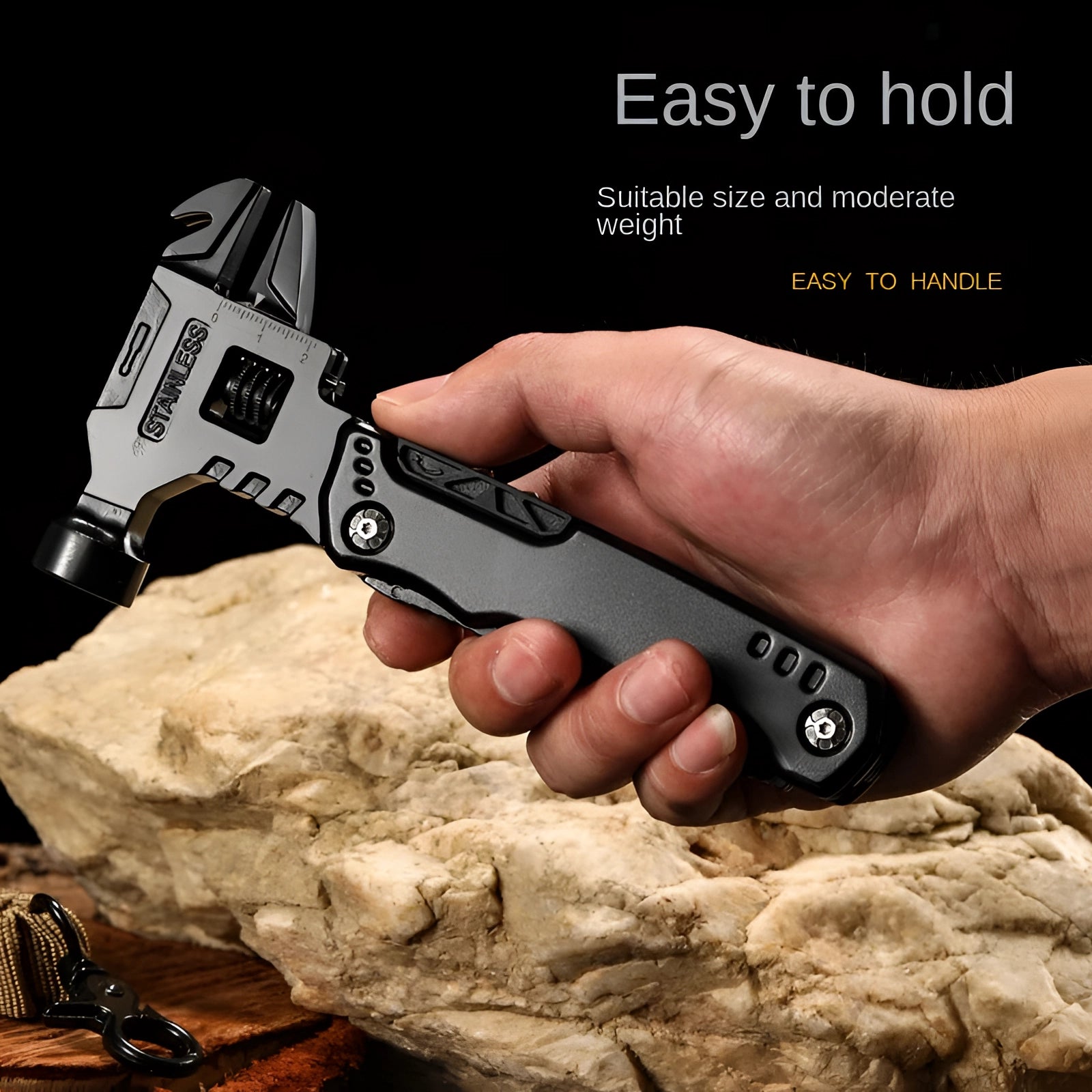 A hand holding a black stainless steel multi-tool knife with various attachments, showcasing a compact and tactical design ideal for outdoor survival.