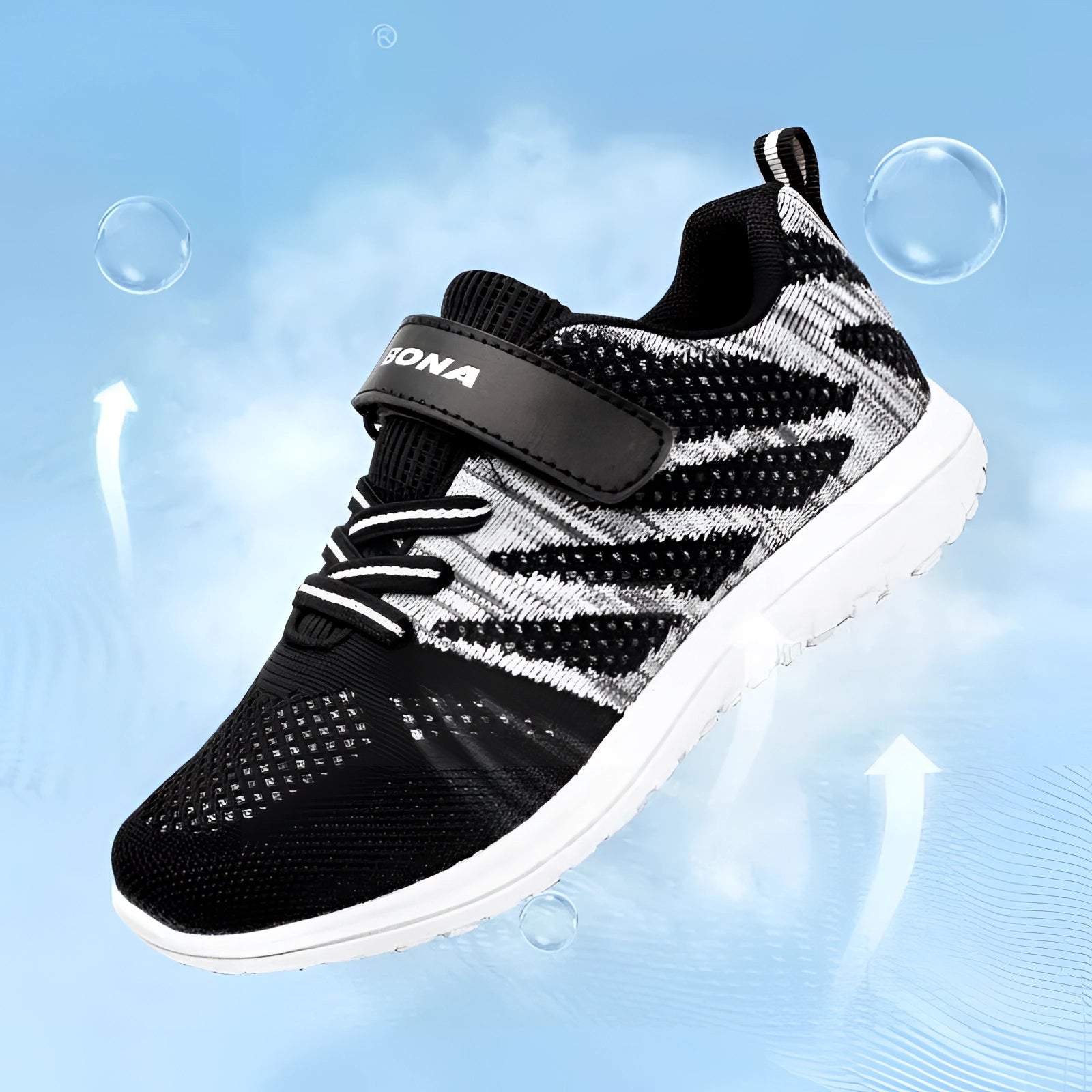 Breathable black mesh kids sneakers with Velcro strap designed for outdoor activities, featuring a comfortable walking shoe style and sporty look.