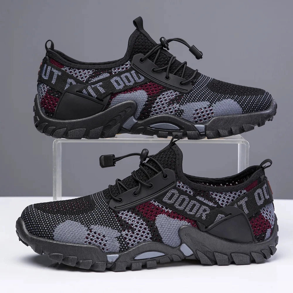 Black breathable waterproof hiking shoes with slip-resistant soles, designed for outdoor activities, shown in size 44.