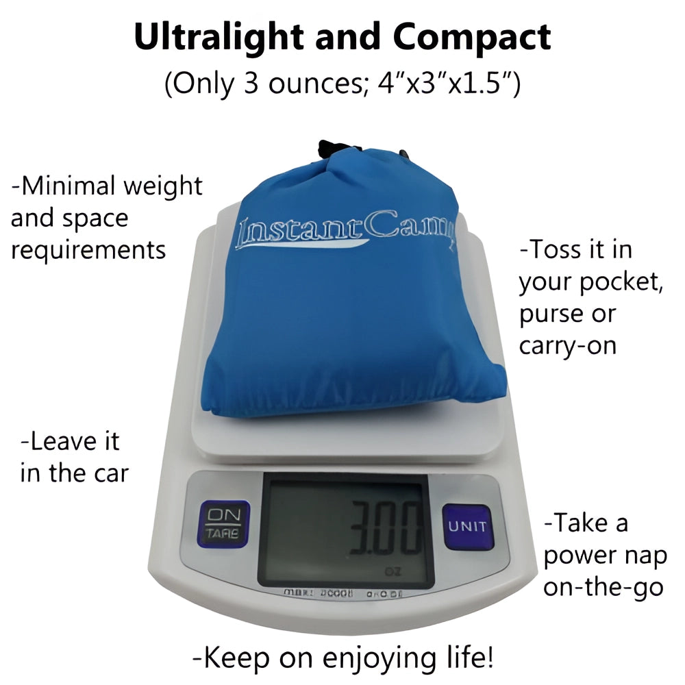 Compact lightweight blue inflatable camping pillow, easy to inflate, shown on a flat surface.