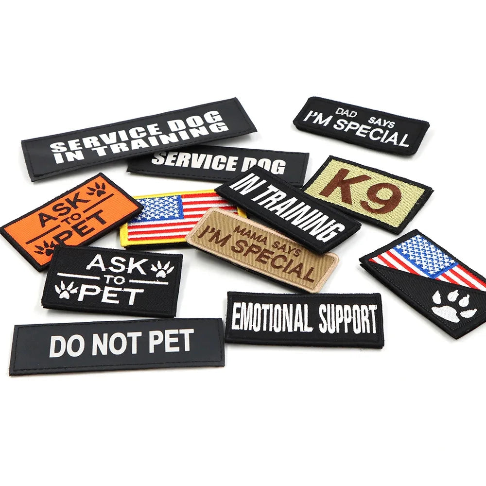 Customizable K9 Harness Patches with text options including Service Dog, Do Not Pet, and Emotional Support, displayed in a rectangular shape with clear font and graphic design.