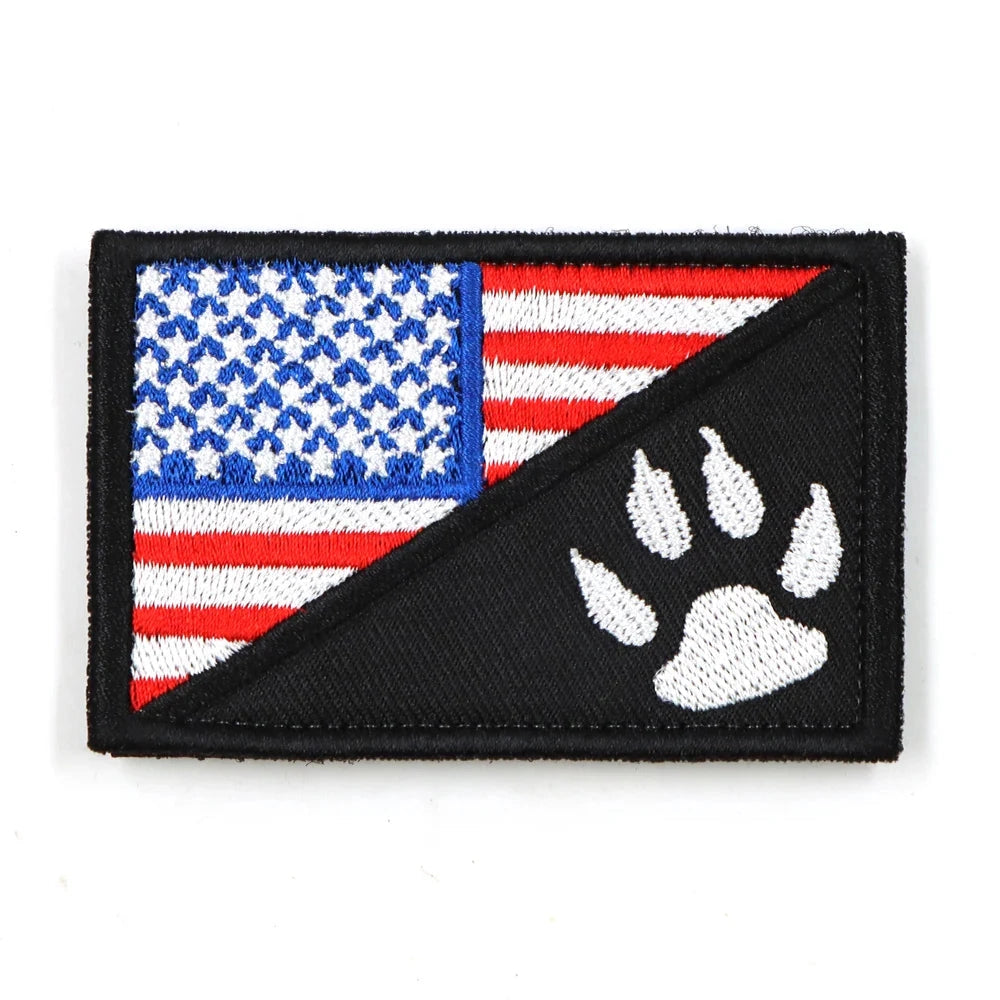 USA Flag with Paw Harness Patch featuring a rectangular design with the American flag and a paw print symbol in electric blue.