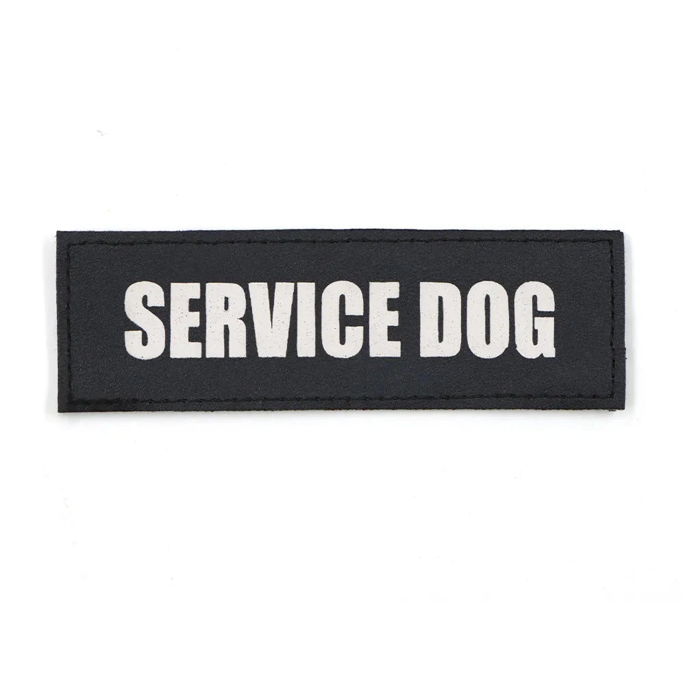 Rectangular harness patch with bold electric blue background, white font displaying "Service Dog," designed for customizable K9 harnesses.