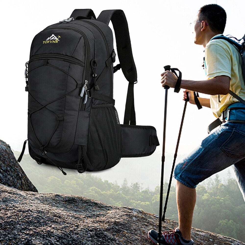 A durable, lightweight 60L hiking backpack with multiple compartments and water-resistant material, set against an outdoor background with clear sky, used by people engaged in recreational hiking and travel.