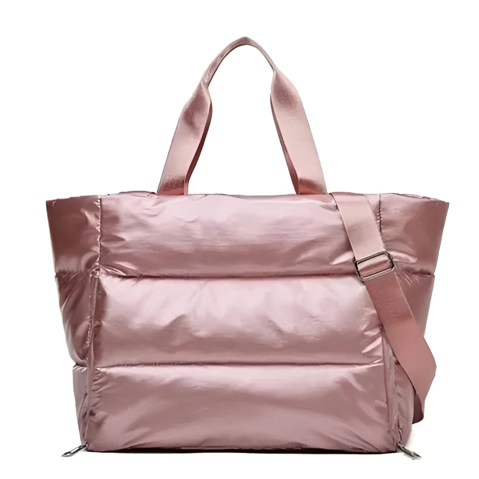 Large pink quilted satin tote bag designed as a fashionable shoulder bag, featuring a rectangular shape and suitable for travel.