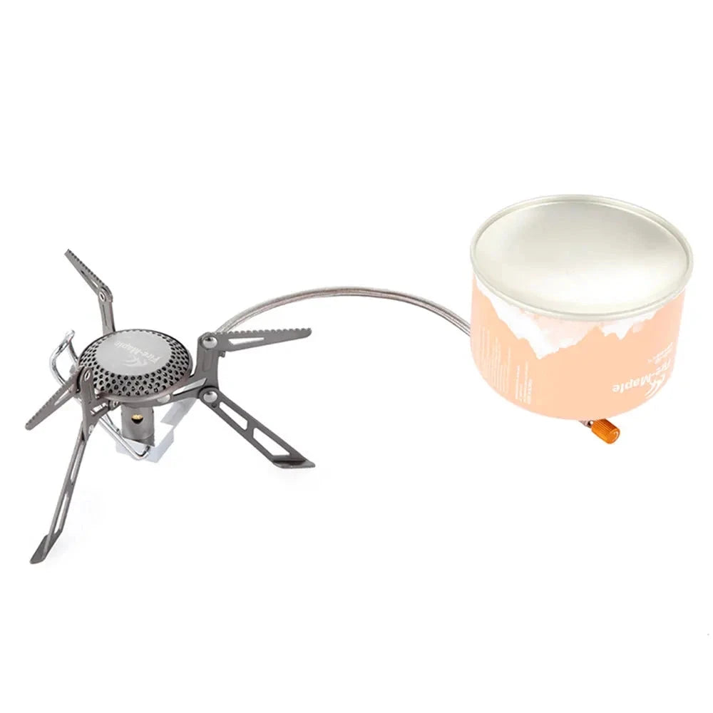 Ultralight windproof camping stove by Fire-Maple, featuring a compact and portable design made of durable metal.