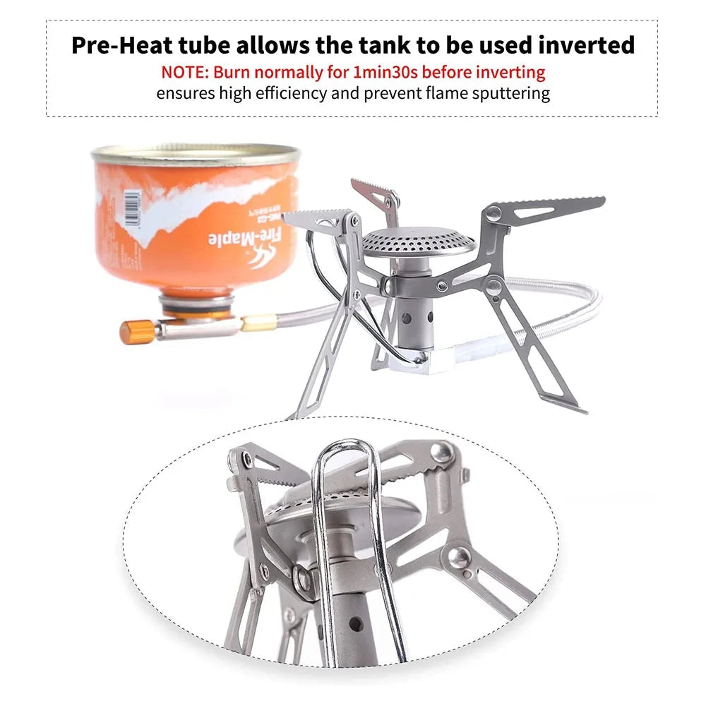 Ultralight and compact Fire-Maple Blade 2 camping stove, designed for wind resistance, shown set up on a camping table with outdoor gear visible in the background.