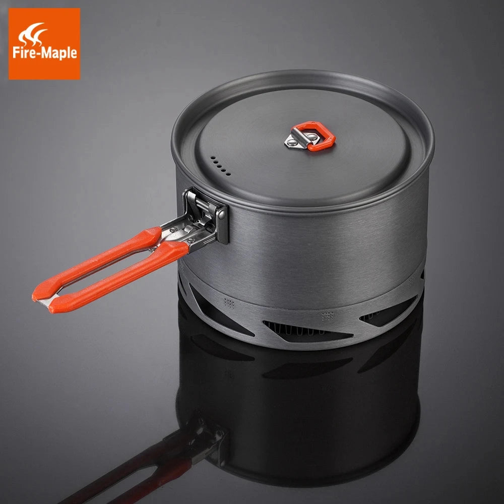 Lightweight camping pot with heat exchanger, designed for efficient cooking outdoors, featuring a compact and cylindrical shape.