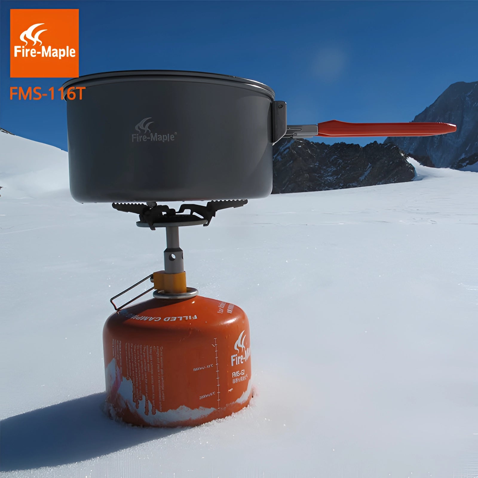 Portable and lightweight Fire-Maple Titanium Camping Stove designed for outdoor cooking, set against a clear sky backdrop.