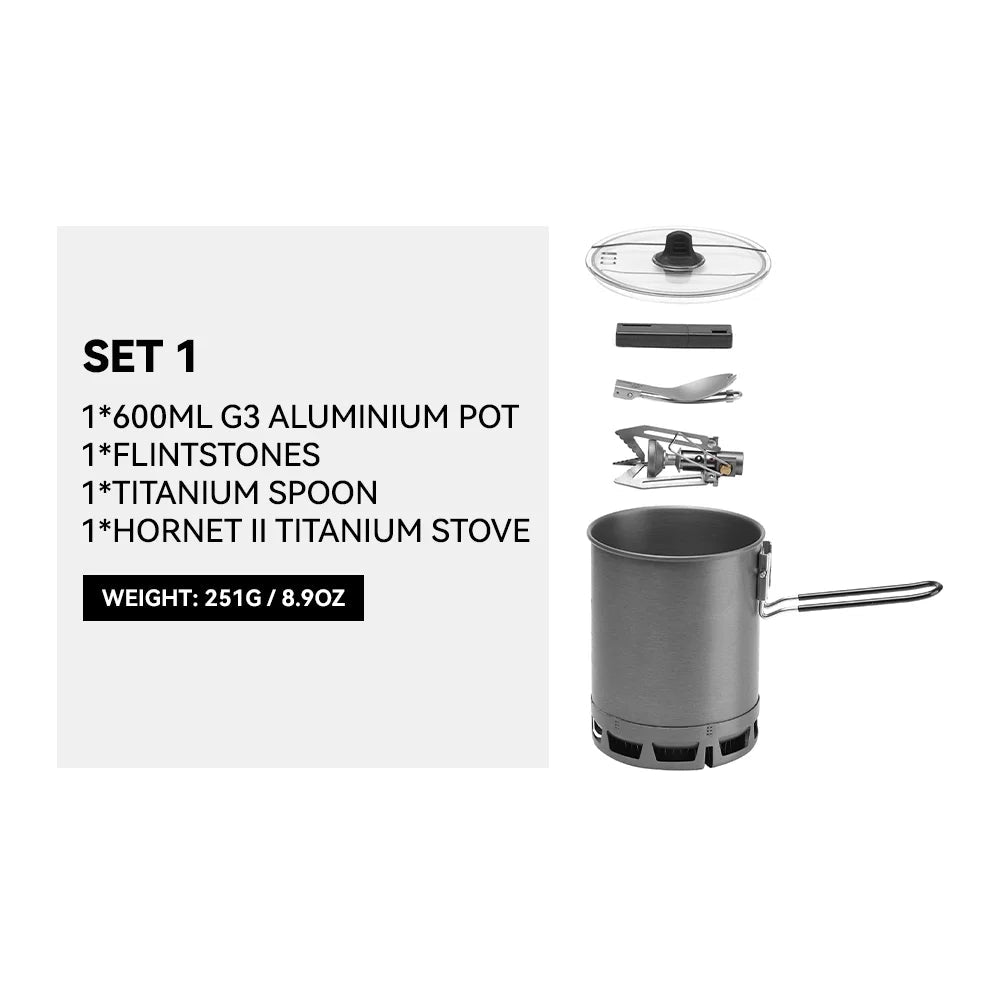 Ultralight backpacking stove with a compact design, featuring a metal base and a small gas cylinder attachment, suitable for outdoor cooking with a saucepan.