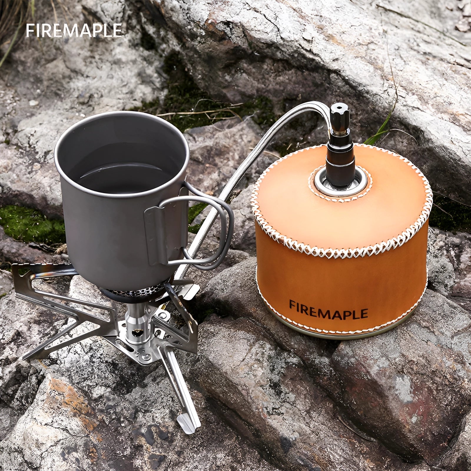 Firemaple Polaris Remote Gas Stove with high-efficiency burner on a camping site, showcasing its robust metal construction and gas compatibility.