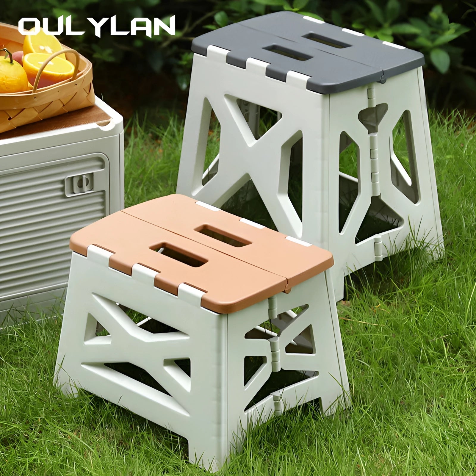 Foldable portable camping stool in a multi-color design, set outdoors on grass, showcasing its lightweight and durable structure suitable for camping or outdoor activities.