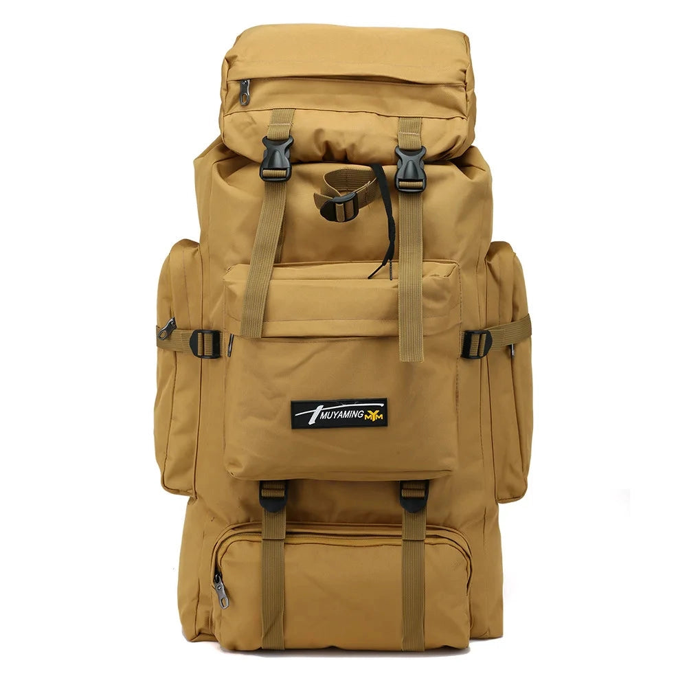 Large khaki 70L tactical backpack with a multicam camouflage pattern, featuring durable material and multiple compartments, brown and beige tones, equipped with sturdy handles and metal accents, designed for outdoor use.