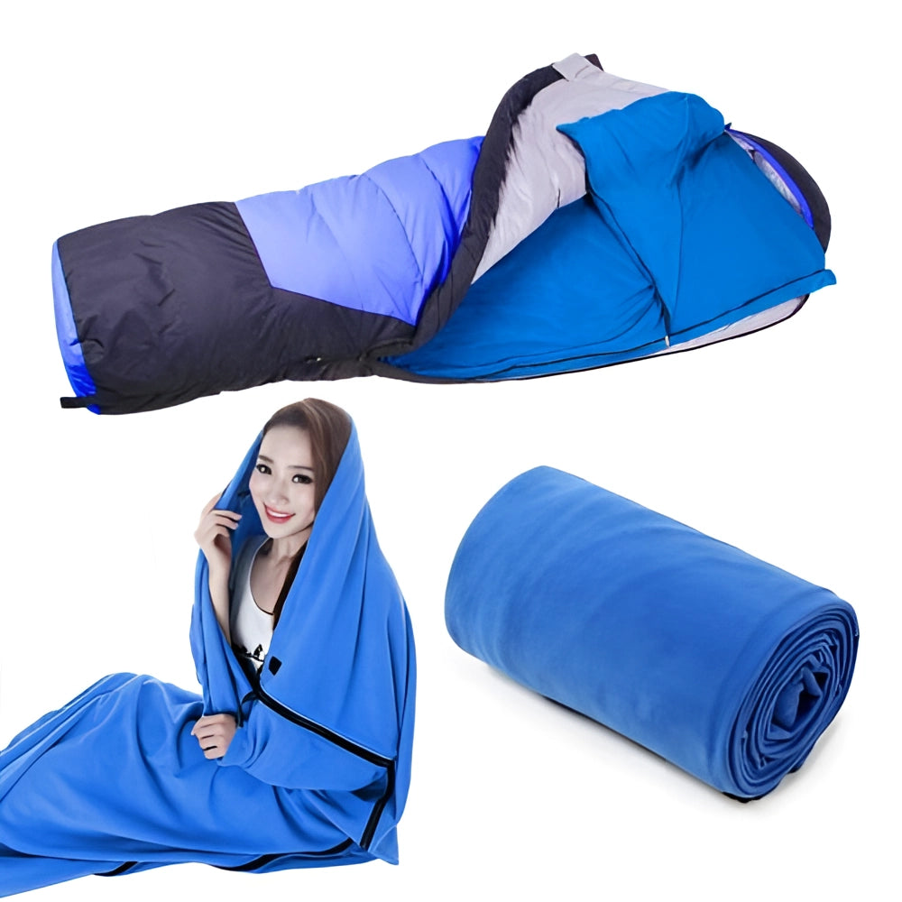 Lightweight all-season water-resistant camping sleeping bag in blue laid out on a flat surface, showcasing its compact and comfortable design.