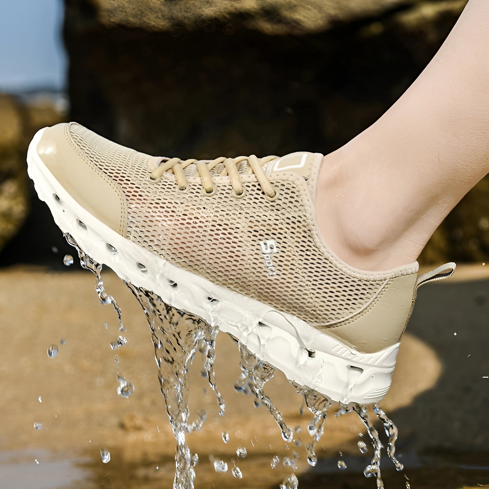 Lightweight breathable mesh running shoes in black and white, featuring cushioned support and durable materials, worn by a person outdoors.