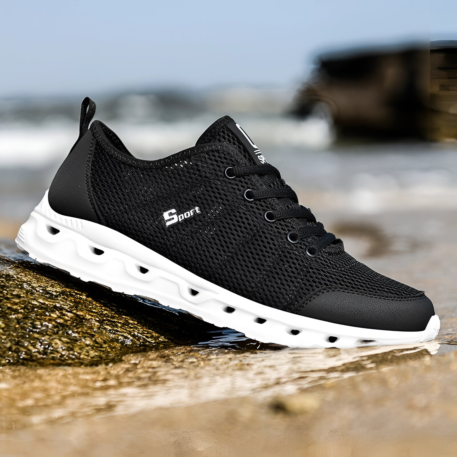 Lightweight breathable mesh running shoes in black and white, cushioned and durable for athletic use, size 12.