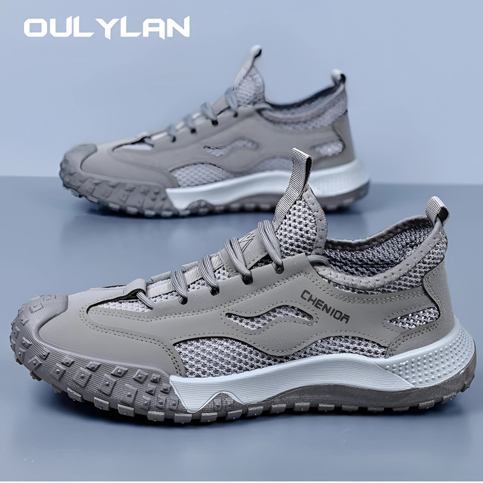 Lightweight men's breathable grey hiking shoes suitable for all-terrain, featuring a sleek design with black and white accents.