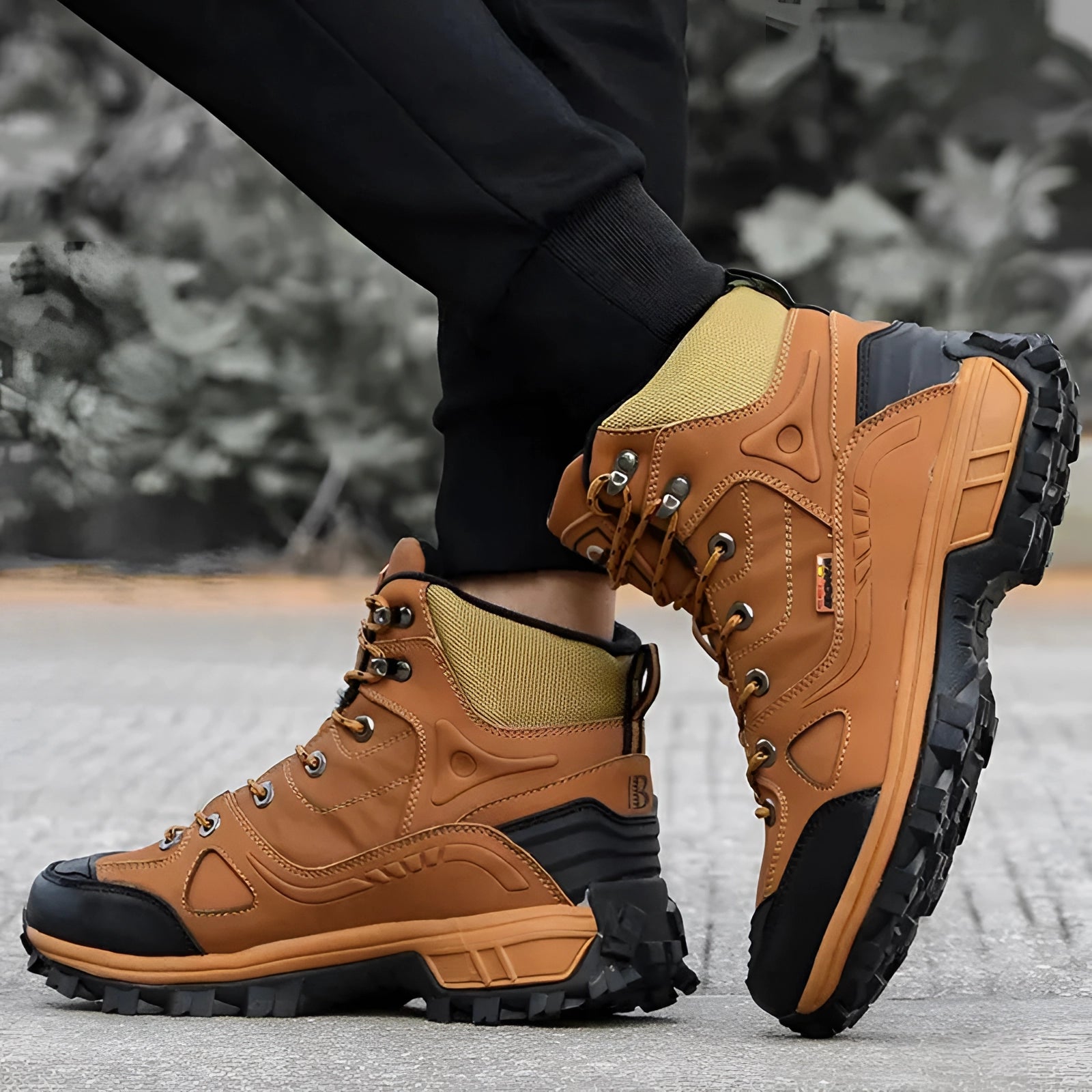 Men's leather waterproof hiking boots featuring durable construction and ankle support, shown being worn outdoors, highlighting their protective and sturdy design for hiking.