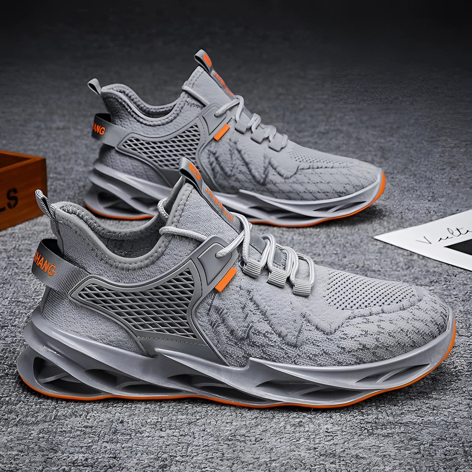 Lightweight grey breathable cushioned running shoes for men, designed for outdoor activities and cross-training, featuring a sleek sneaker design.