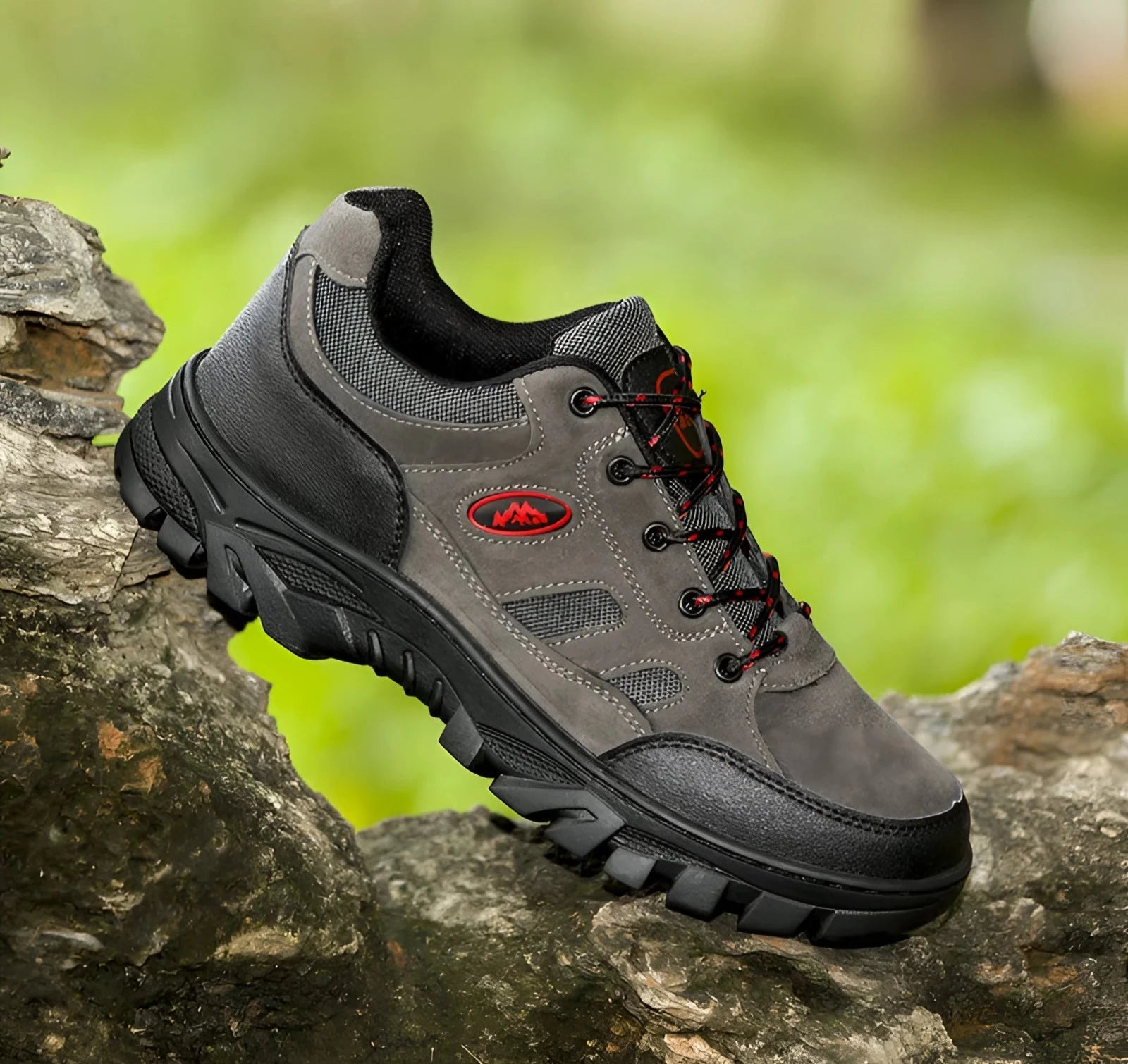 Men's waterproof hiking shoes on grassy outdoor terrain with a person wearing them, showcasing their durability and anti-slip features in a natural setting.