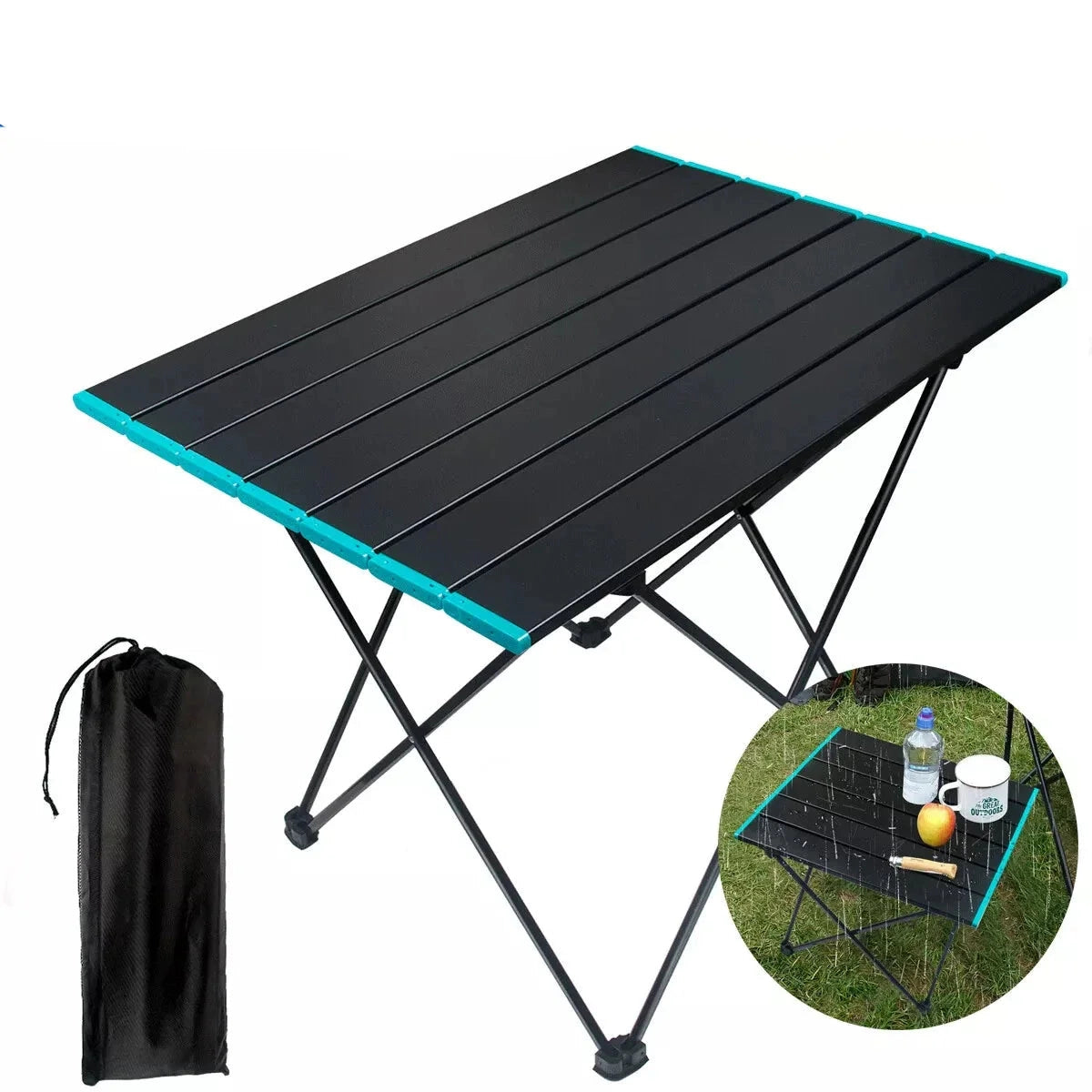 Portable black aluminum folding camping table with carrying bag set up outdoors.