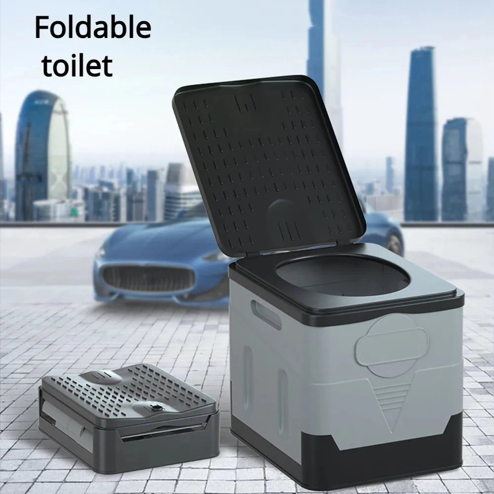 Portable foldable toilet shown outdoors, compact and lightweight design, suitable for camping.