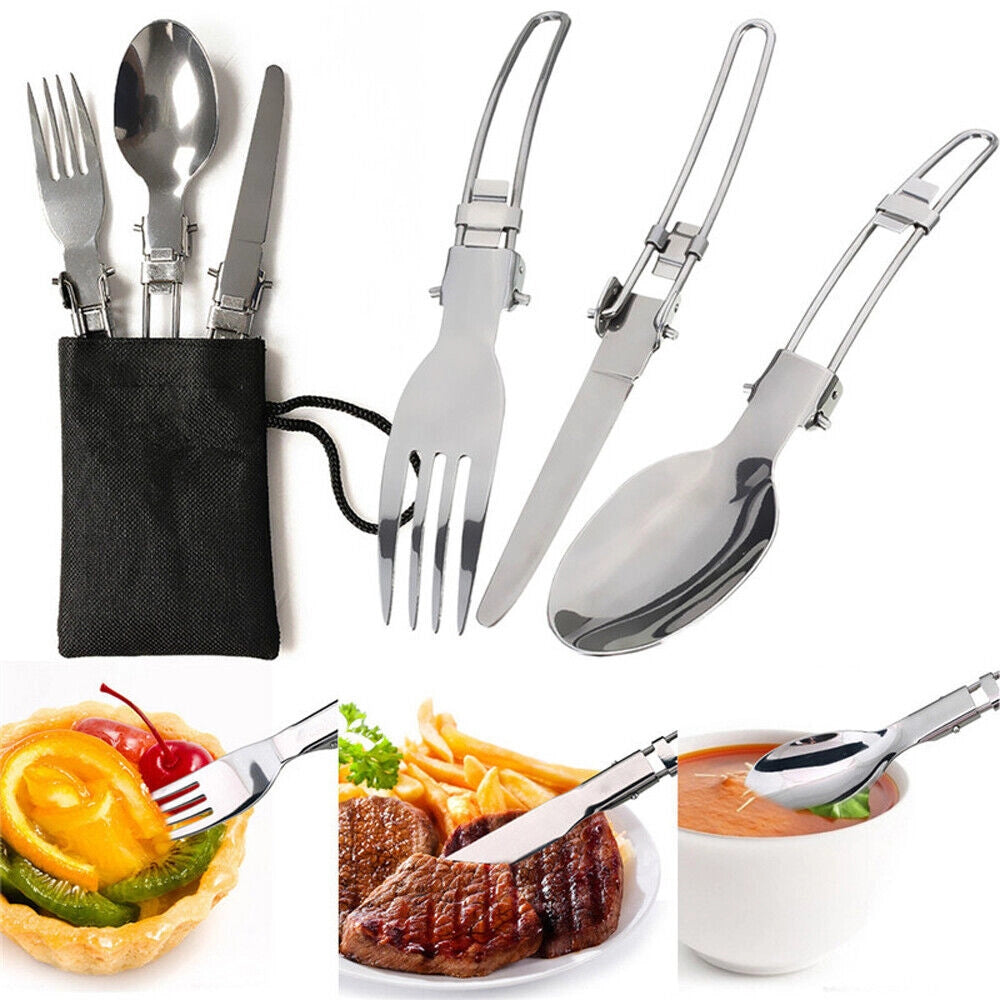 A portable gas stove displayed on a campsite table with various kitchen utensils, tableware, and ingredients, ready for cooking a meal.