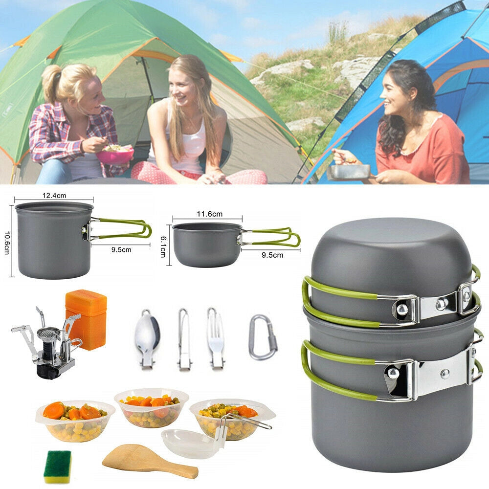 Portable gas stove setup on a campsite with a clear sky in the background, highlighting its lightweight and durable design for family camping.