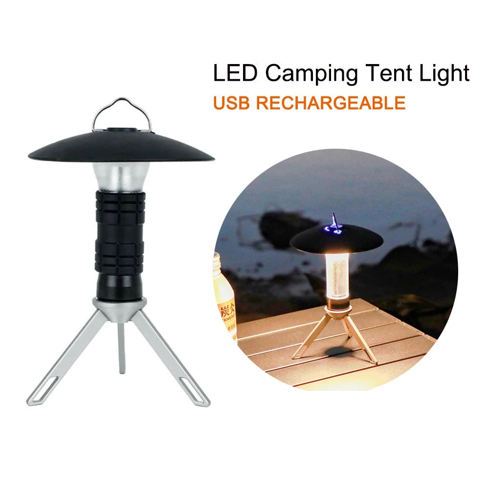 Rechargeable LED camping lantern with Type-C fast charge, portable and waterproof, placed on a wooden surface with a tree in the background.