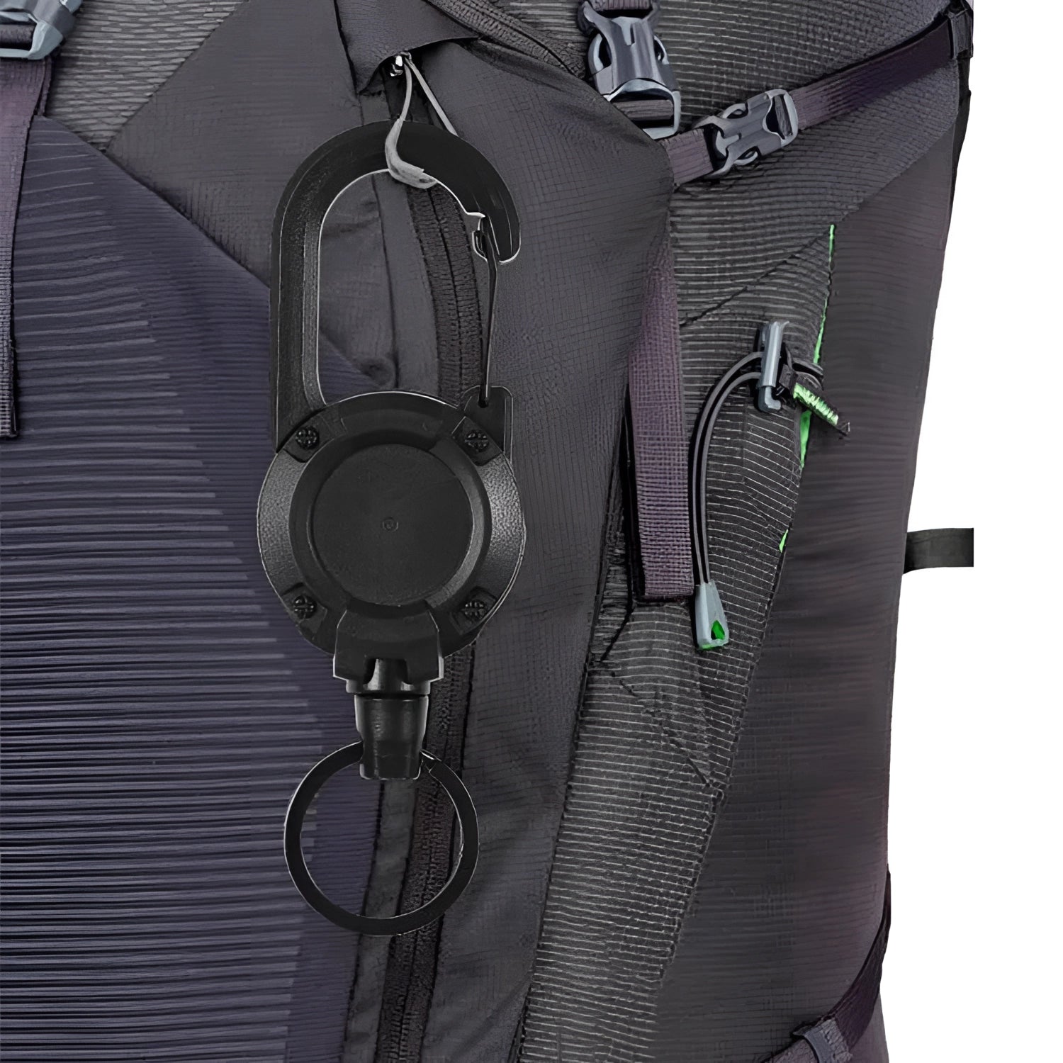 Durable grey tactical backpack clips with quick release D-rings for military gear, attached to a grey bag.