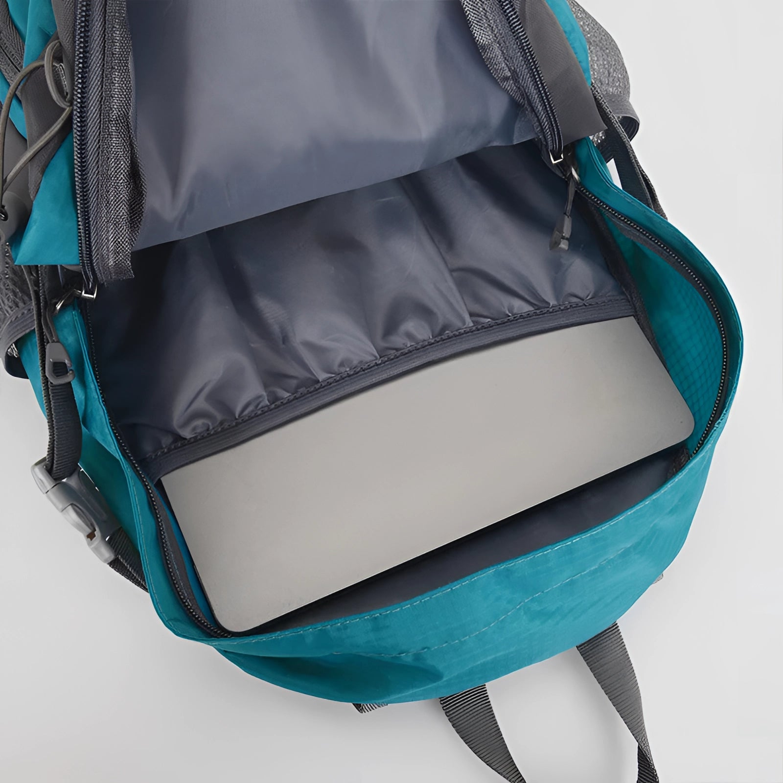 Lightweight azure hiking backpack with multiple pockets, designed for water resistance and ergonomic comfort, ideal for travel and outdoor activities.