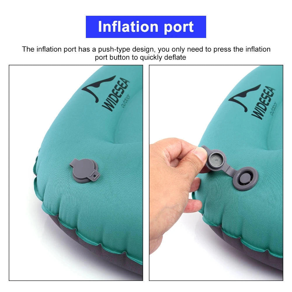 Inflatable camping pillow in electric blue color held by a hand, showcasing its ergonomic design and portable, waterproof material.