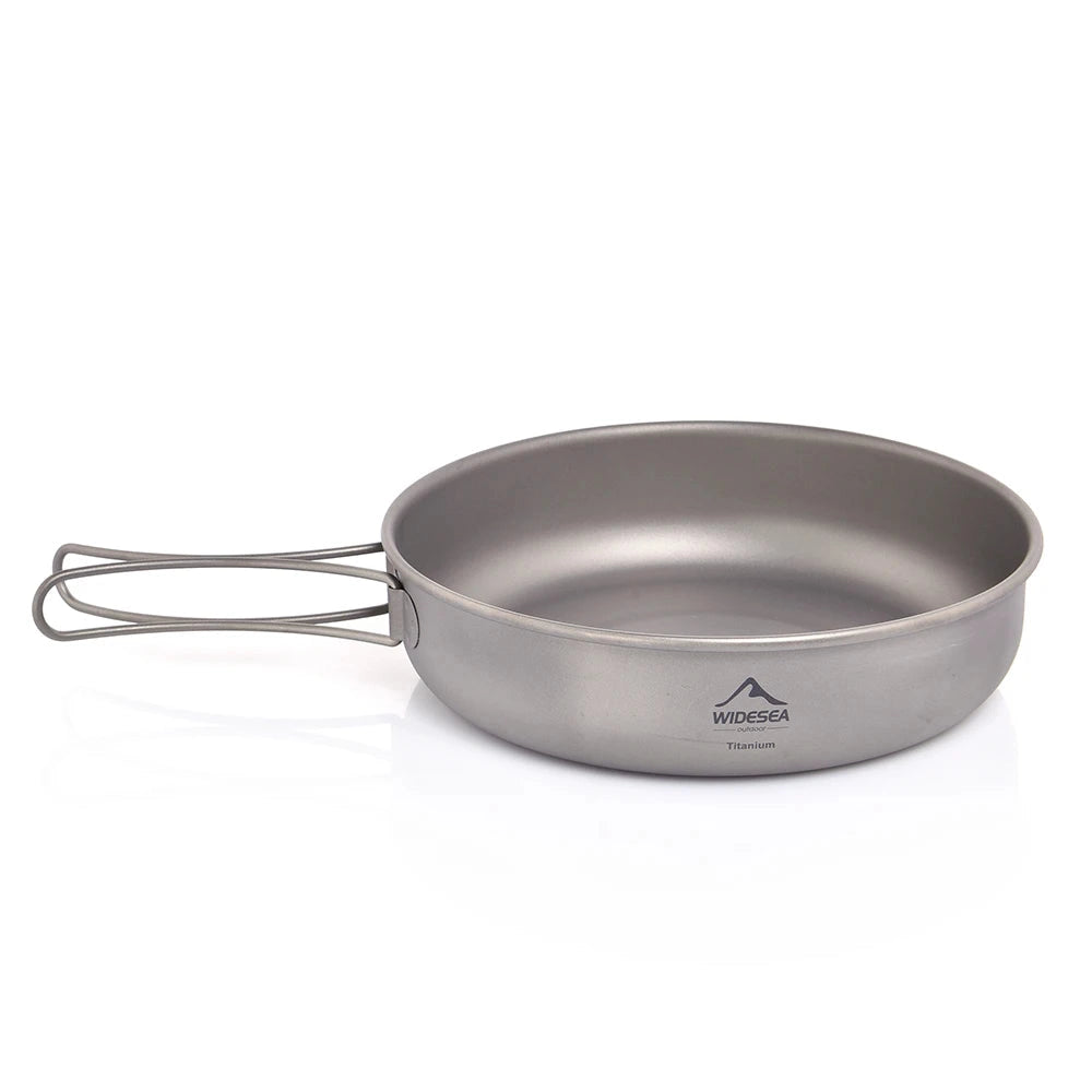 Lightweight non-stick camping skillet with a 17.4CM diameter, made of durable metal, designed for portable hiking and outdoor cooking activities.