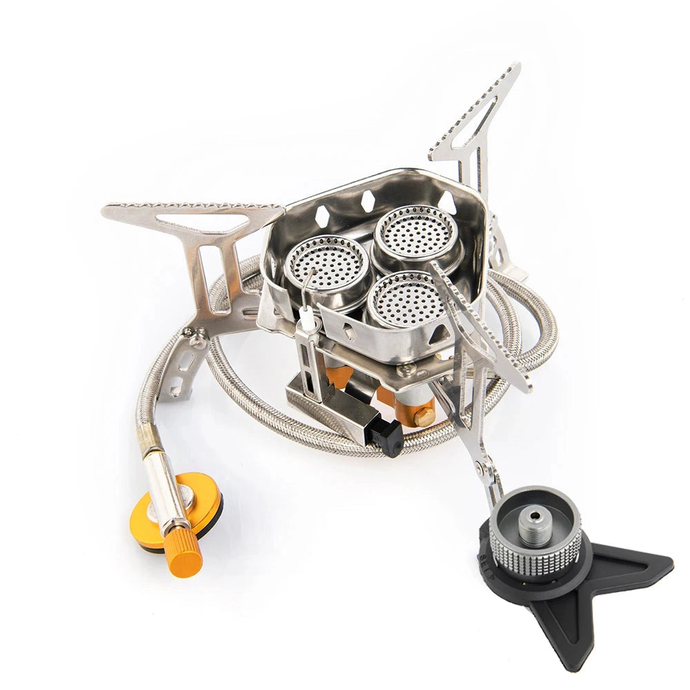 Compact and portable camping stove with a new adaptor, featuring a high-efficiency burner and metal construction.