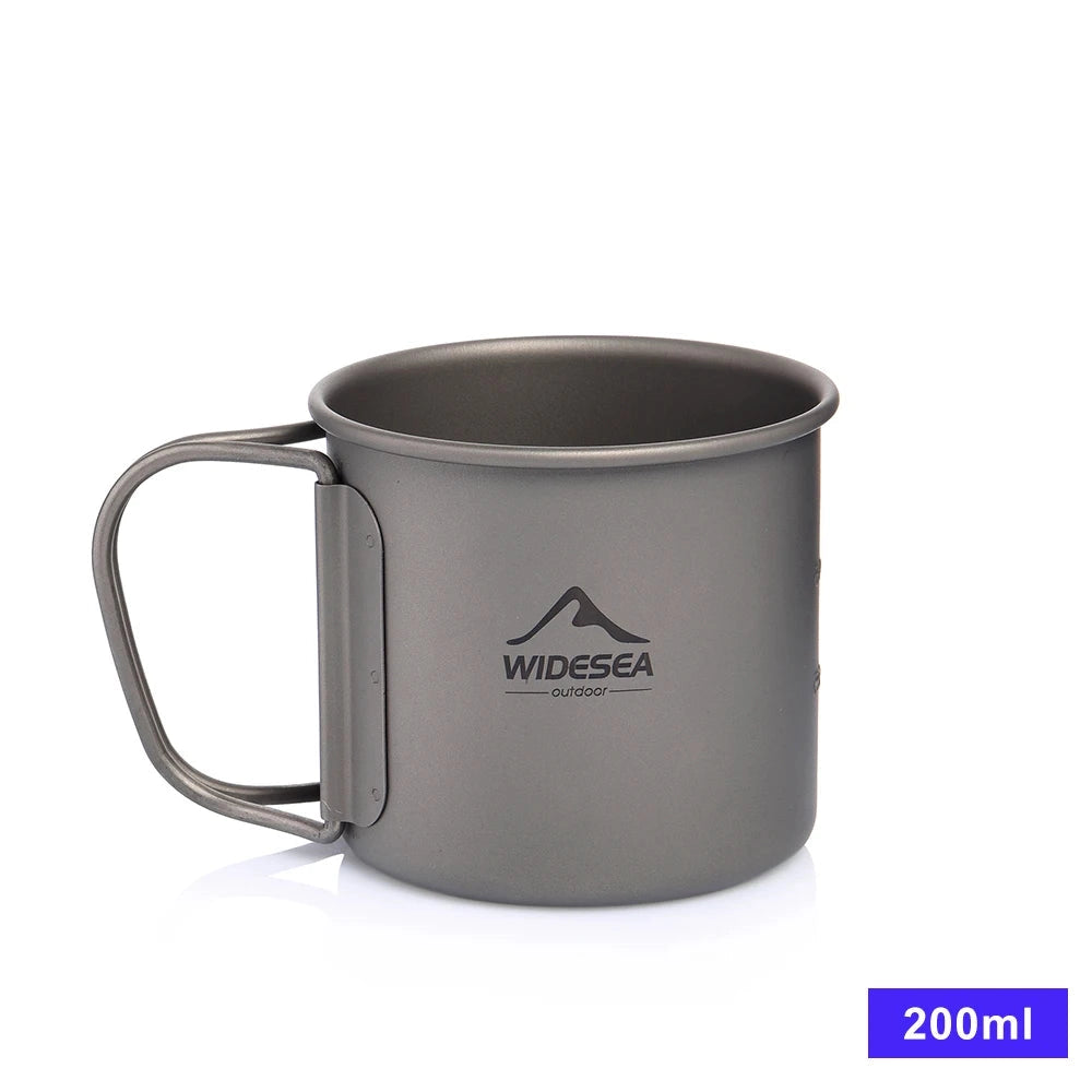 Titanium camping mug with a 200ml capacity, part of a lightweight and portable cookware set, designed for outdoor use.