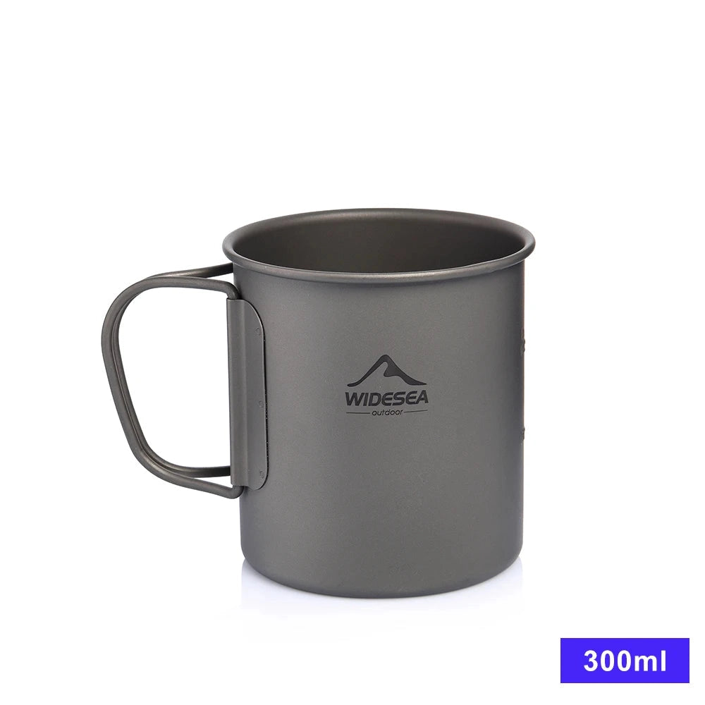 Titanium camping mug with a 300ml capacity, designed for lightweight and portable use, suitable for outdoor activities and camping trips.