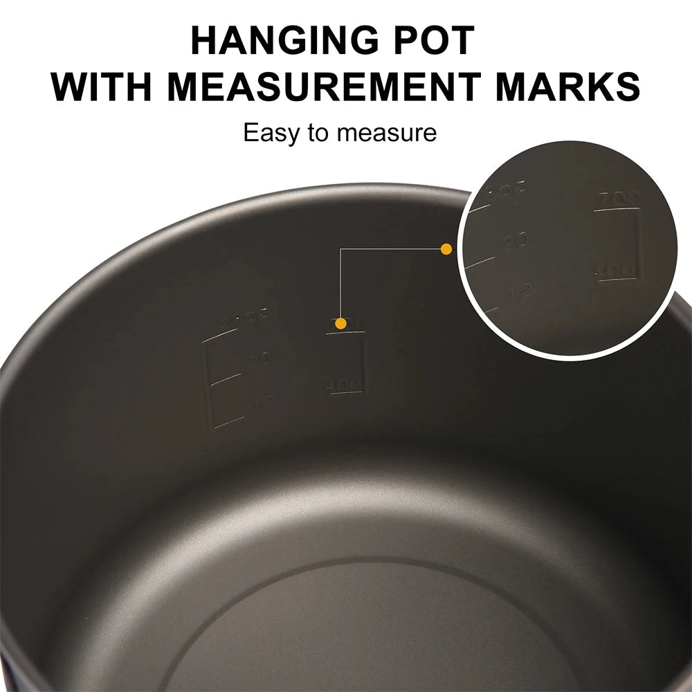 Lightweight titanium non-stick camping pot with a sleek design, ideal for outdoor cooking and camping activities.