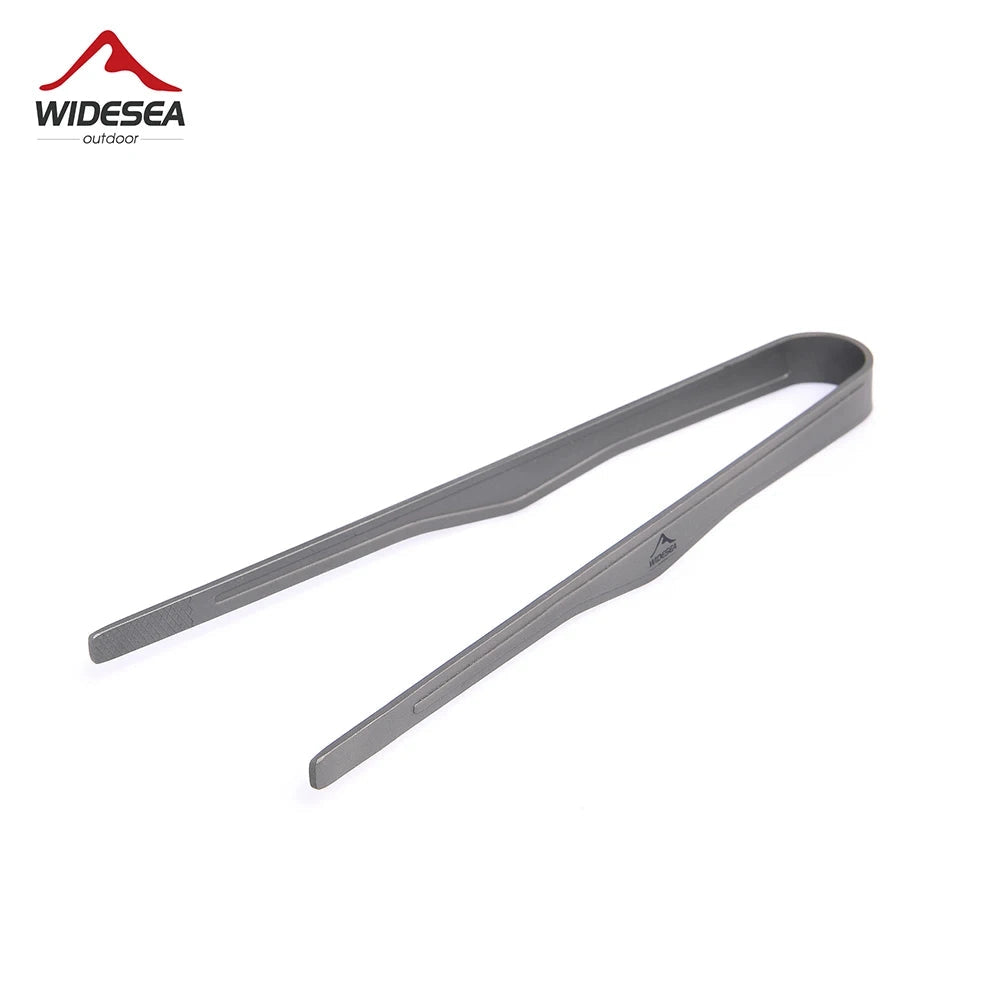 Ultralight camping tongs made from durable titanium, featuring a heat-resistant design. The tongs have a sleek metallic appearance, suitable for outdoor cooking and camping activities.