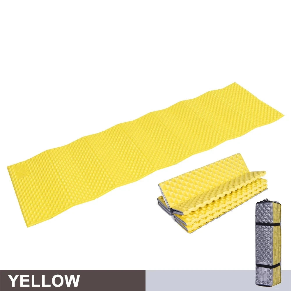 Ultralight camping mat in yellow with a non-slip surface and thermal padding, featuring the WIDESEA logo, displayed against a natural earthy backdrop.