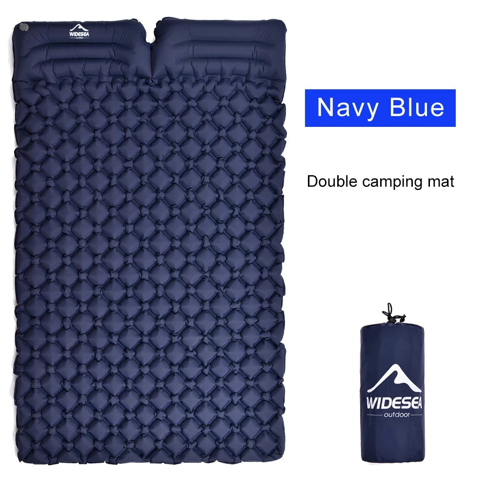 Ultralight double-wide inflatable camping mattress in navy blue, neatly folded and displayed in a compact rectangular shape, highlighting its portability and suitability for outdoor use.