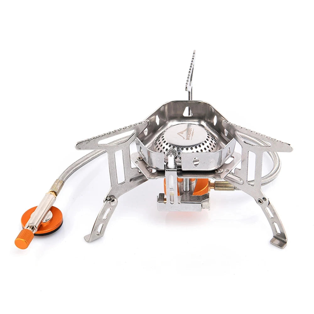 Windproof stainless steel camping stove with a portable gas burner, designed for outdoor use.